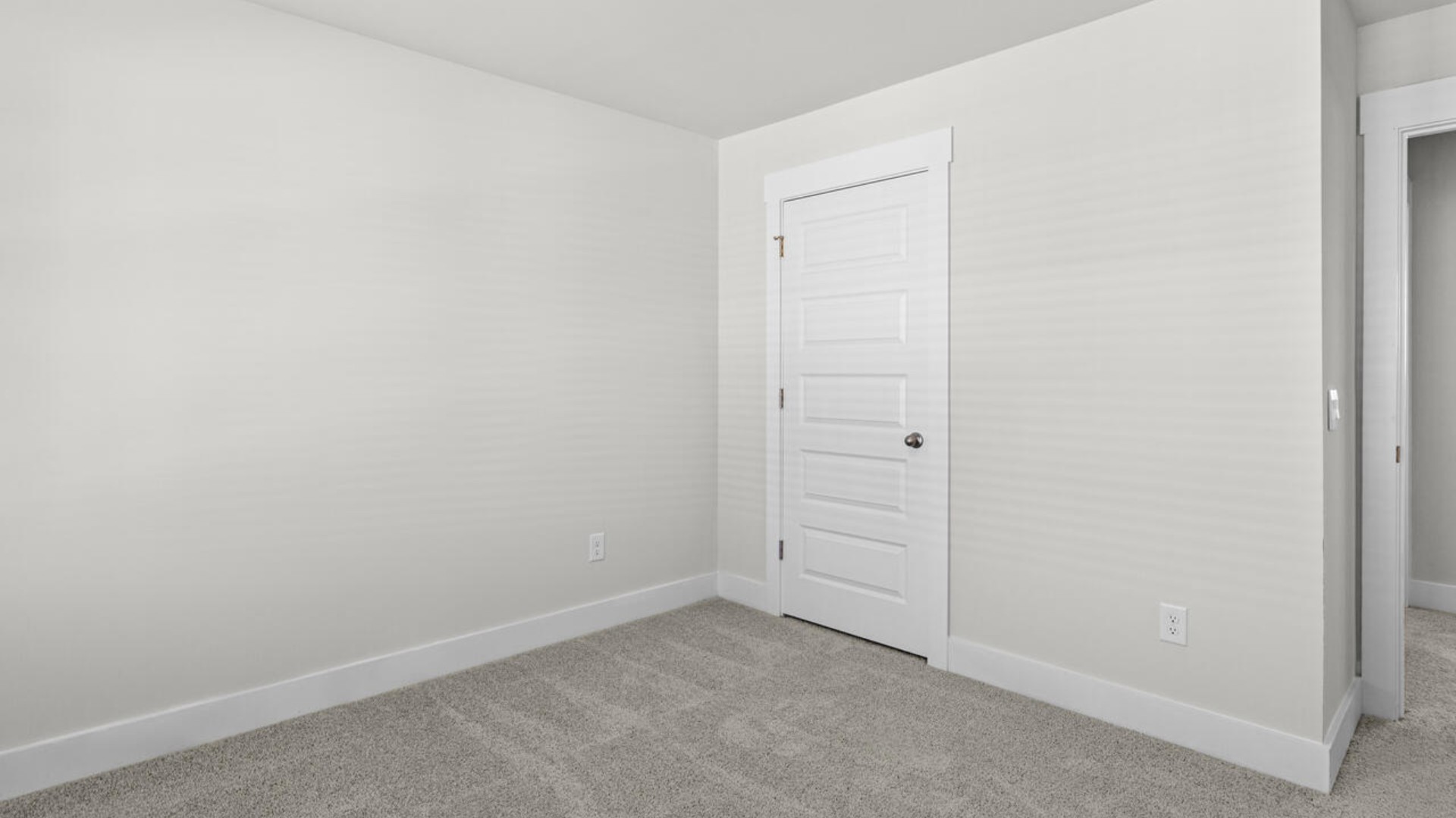 Upstairs, there are 3 more bedrooms, a shared bathroom and a loft area, adding to the flexibility of the layout. For those in search of a contemporary townhome with a functional layout, the Norman is an excellent choice.