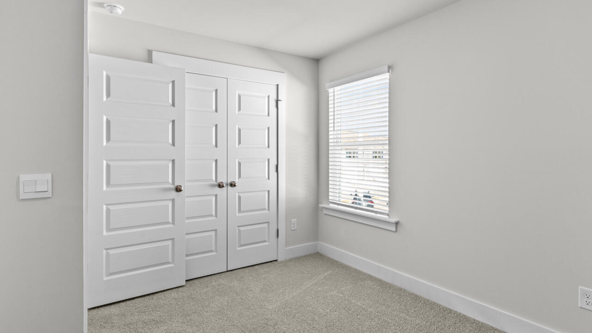 Upstairs, there are 3 more bedrooms, a shared bathroom and a loft area, adding to the flexibility of the layout. For those in search of a contemporary townhome with a functional layout, the Norman is an excellent choice.