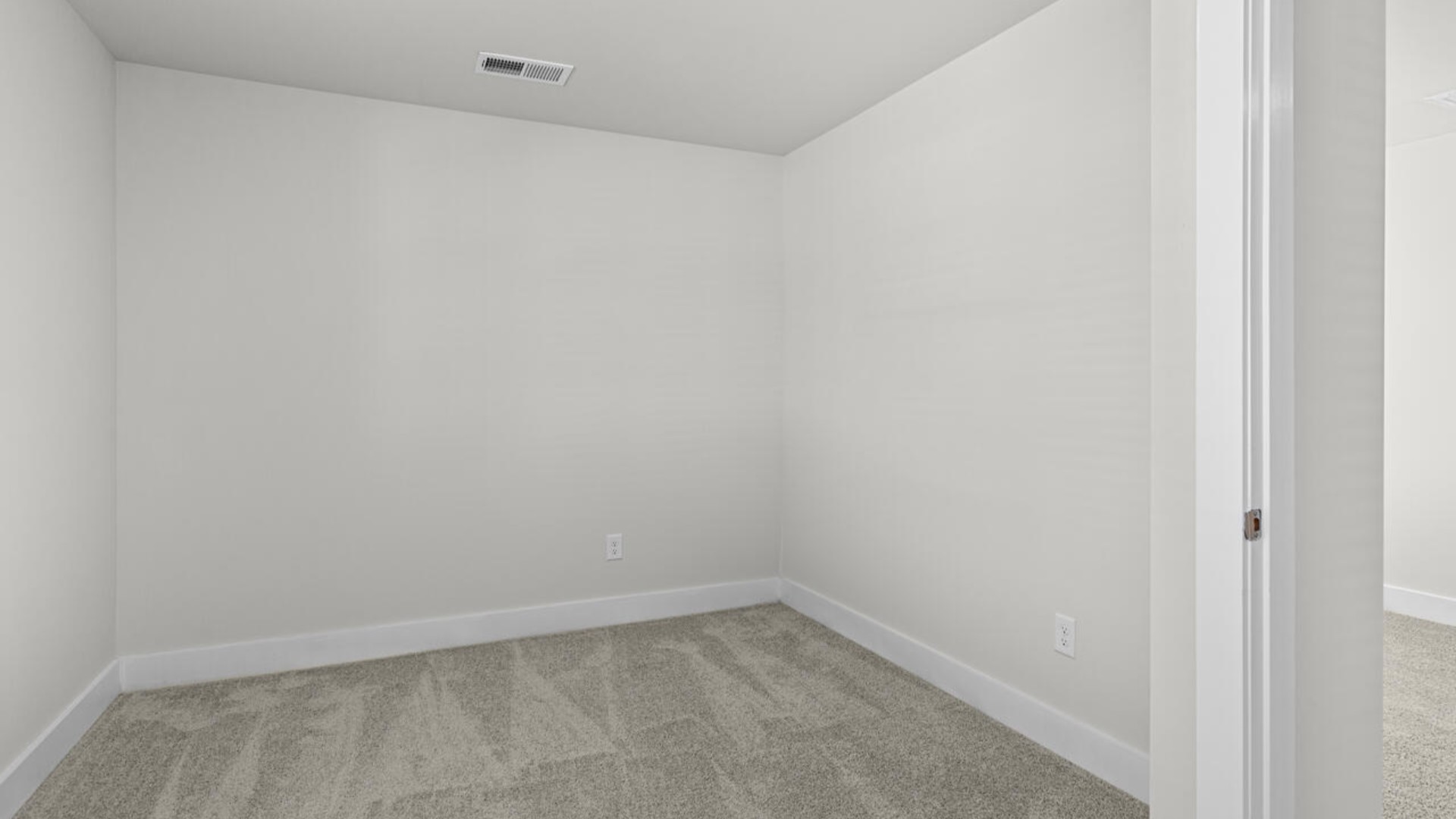Upstairs, there are 3 more bedrooms, a shared bathroom and a loft area, adding to the flexibility of the layout. For those in search of a contemporary townhome with a functional layout, the Norman is an excellent choice.