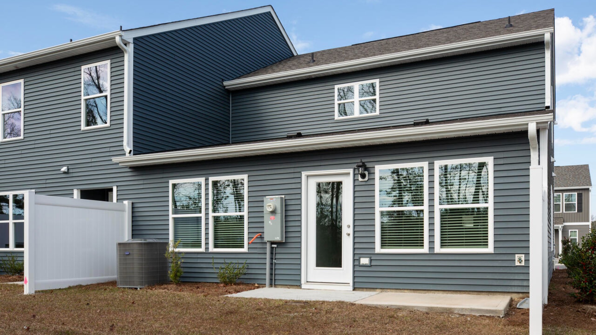 Enjoy the covered porch perfect for entertaining and enjoying the Carolina evenings