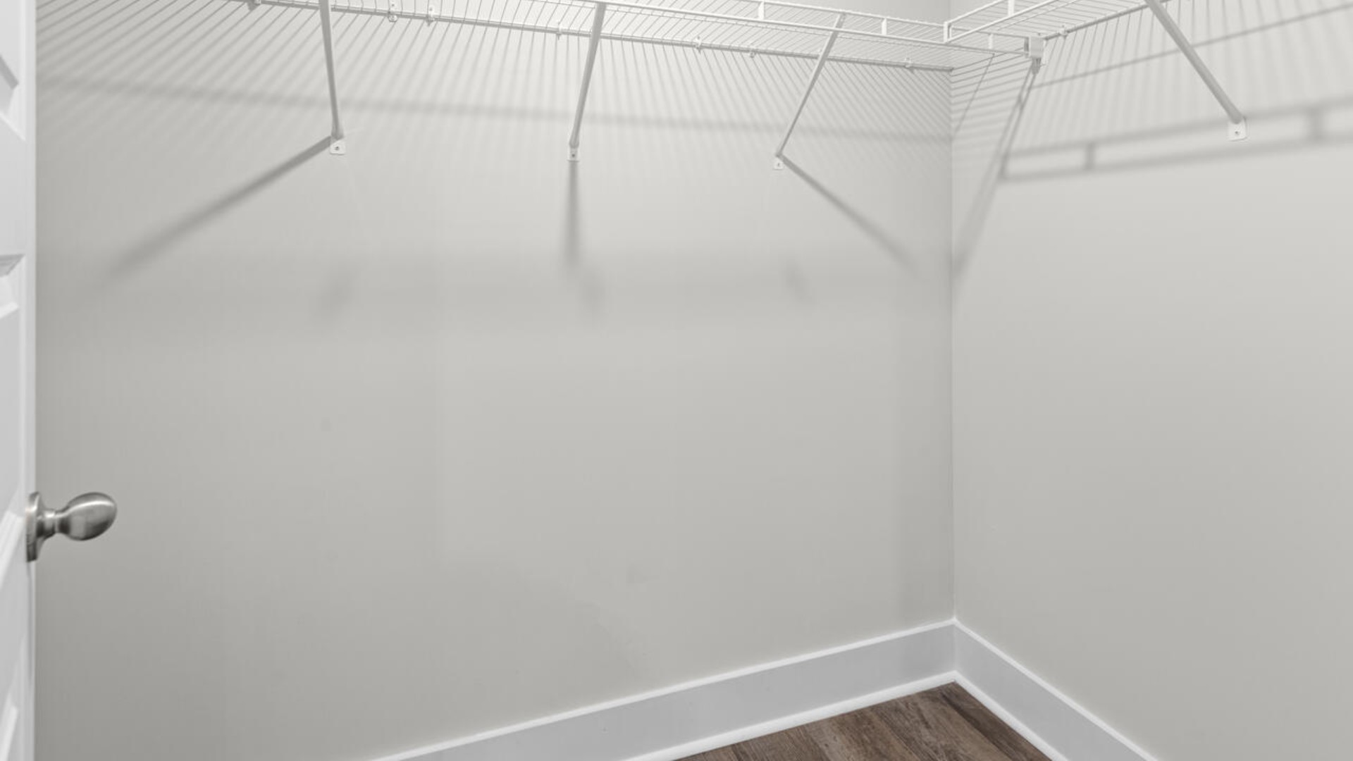 The primary suite is conveniently located just off the living room.