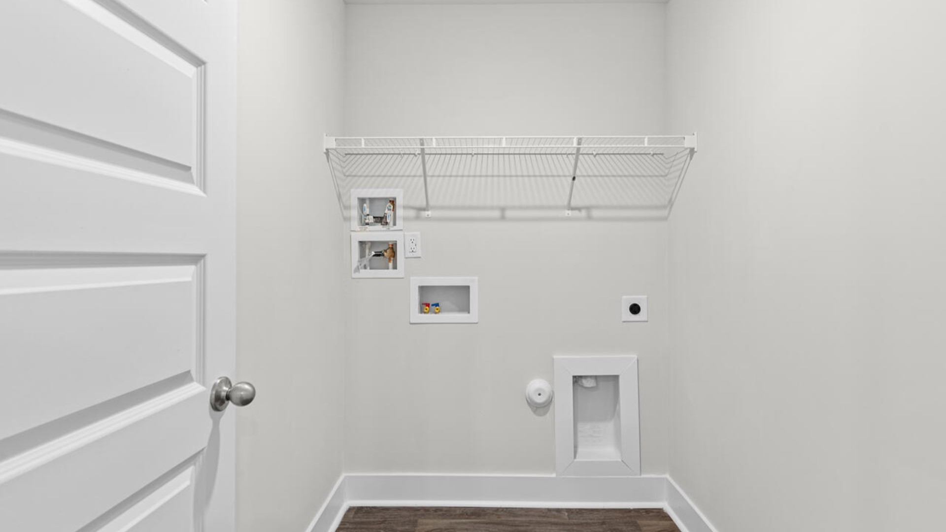 The primary suite is conveniently located just off the living room.