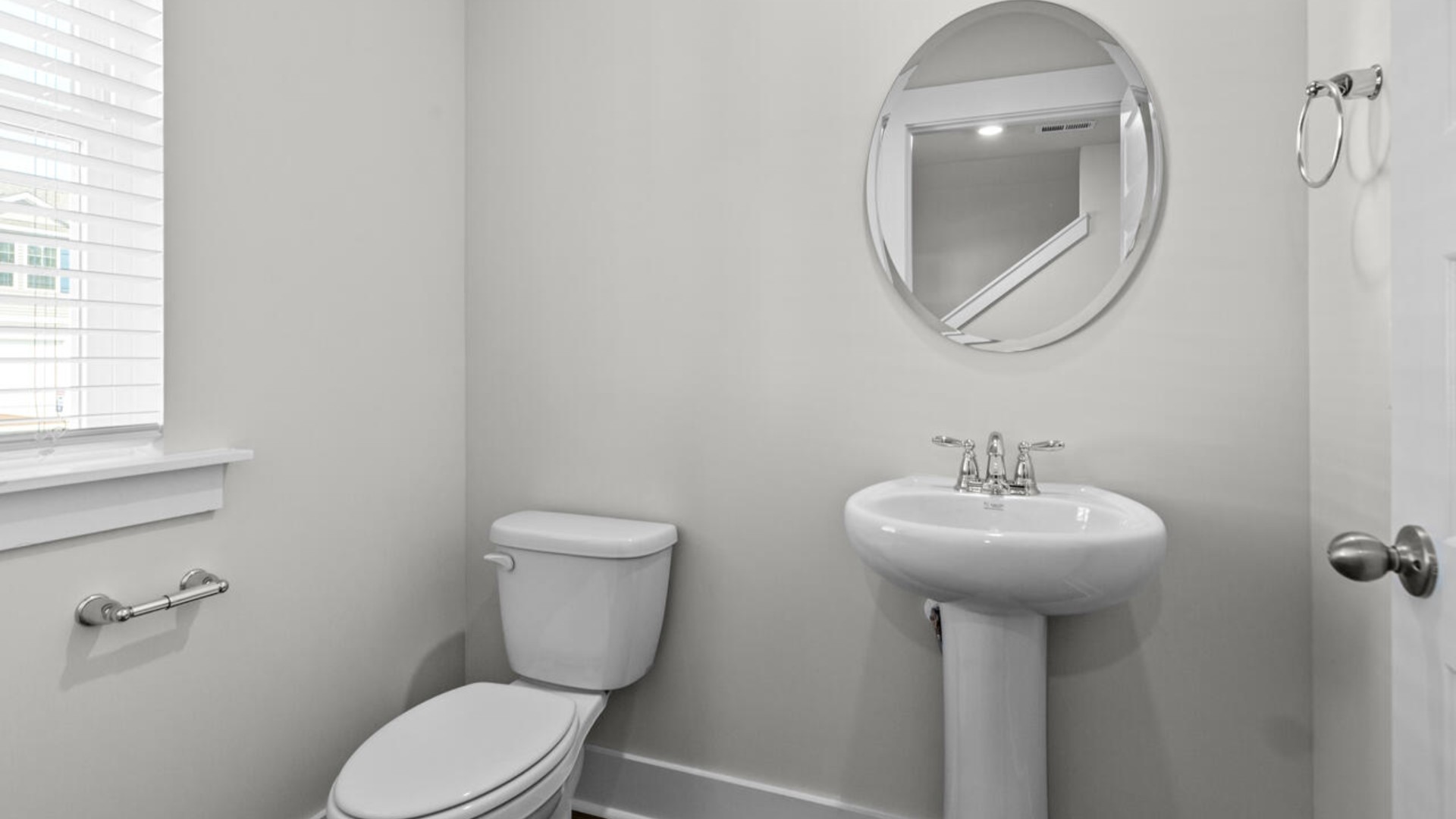 The primary suite is conveniently located just off the living room.