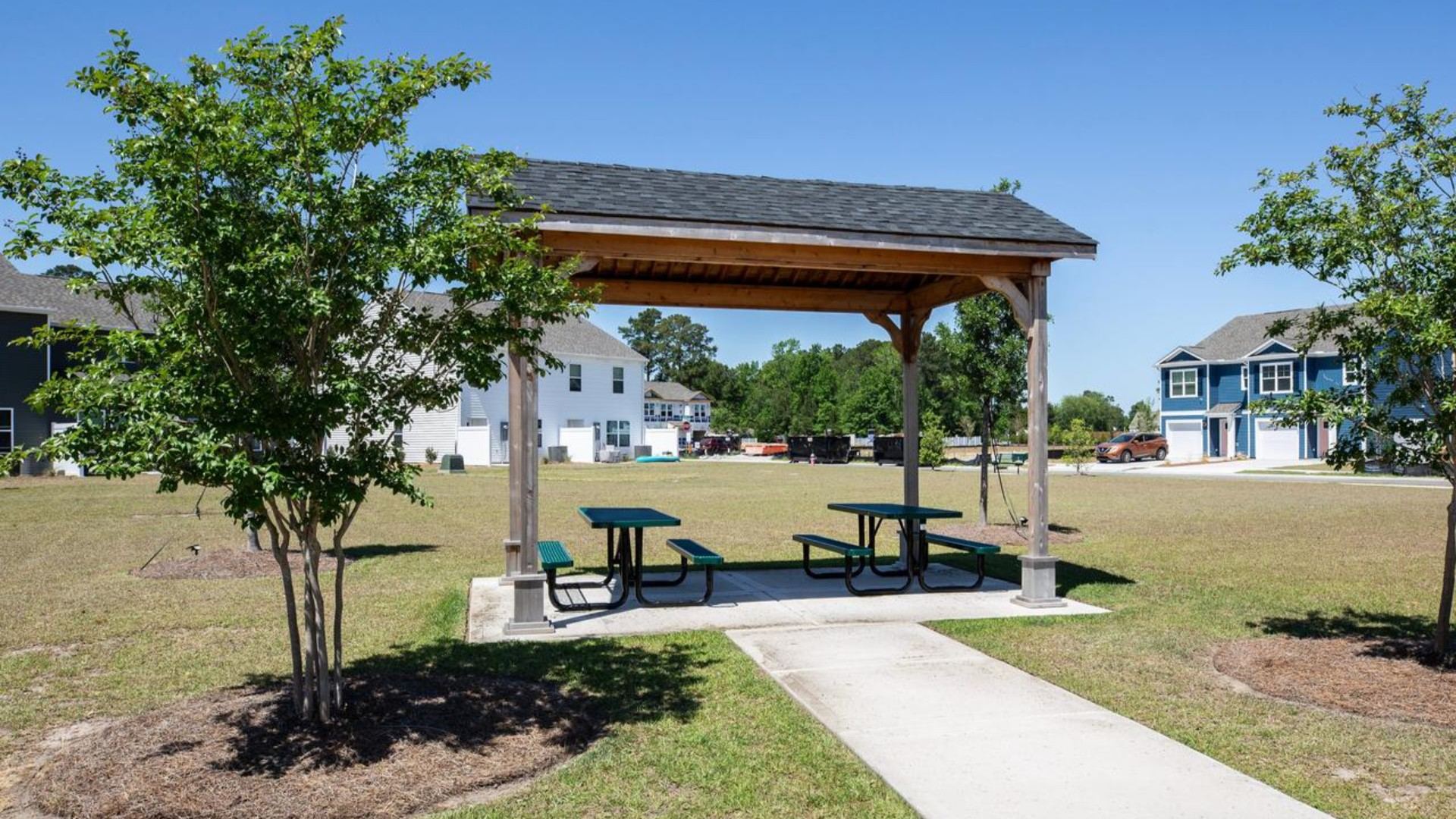Homeowners enjoy the community amenities a pool, pavilion, fire pit, playground, and grill stations.