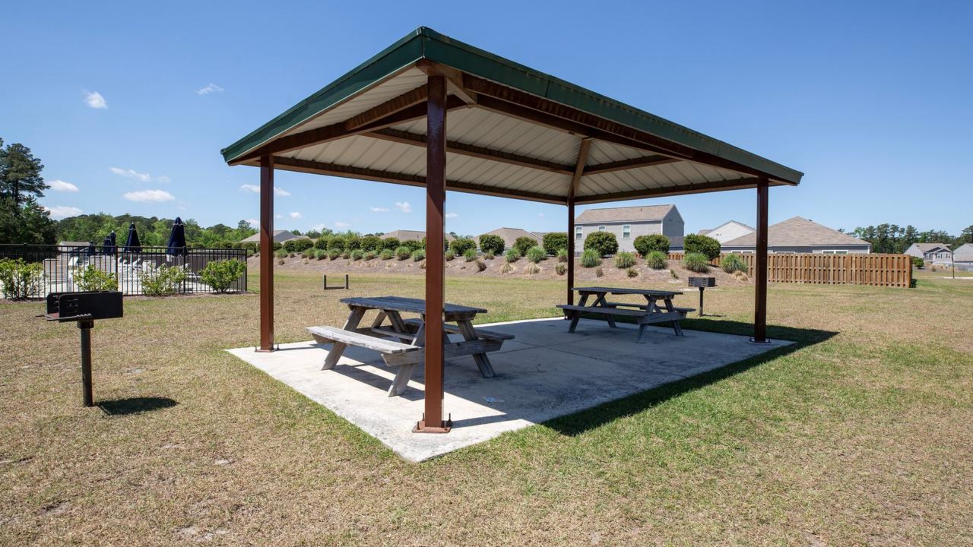 Homeowners enjoy the community amenities a pool, pavilion, fire pit, playground, and grill stations.