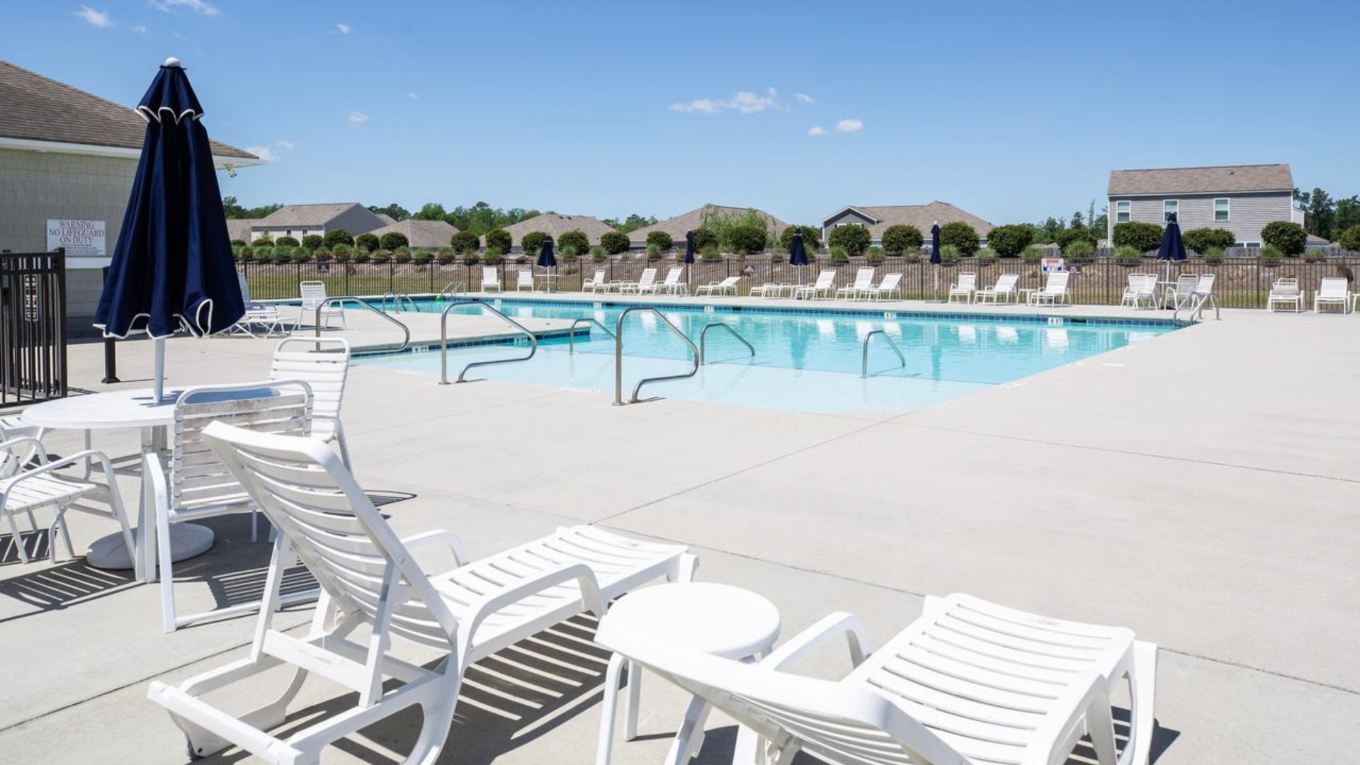 Homeowners enjoy the community amenities a pool, pavilion, fire pit, playground, and grill stations.