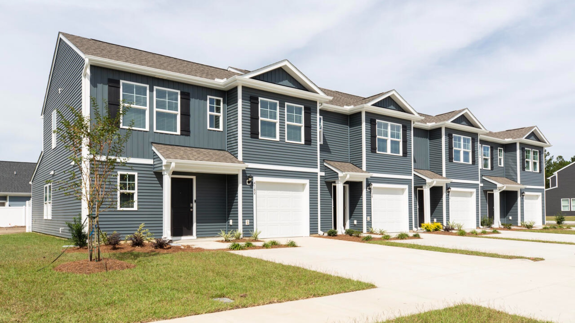 Welcome to the Norman a 4-bedroom, 2.5-bathroom, 1,763 square foot end unit townhome that's not just a house, but your future happy place! Located in our Townes at SeaBrooke community in Leland, North Carolina.
