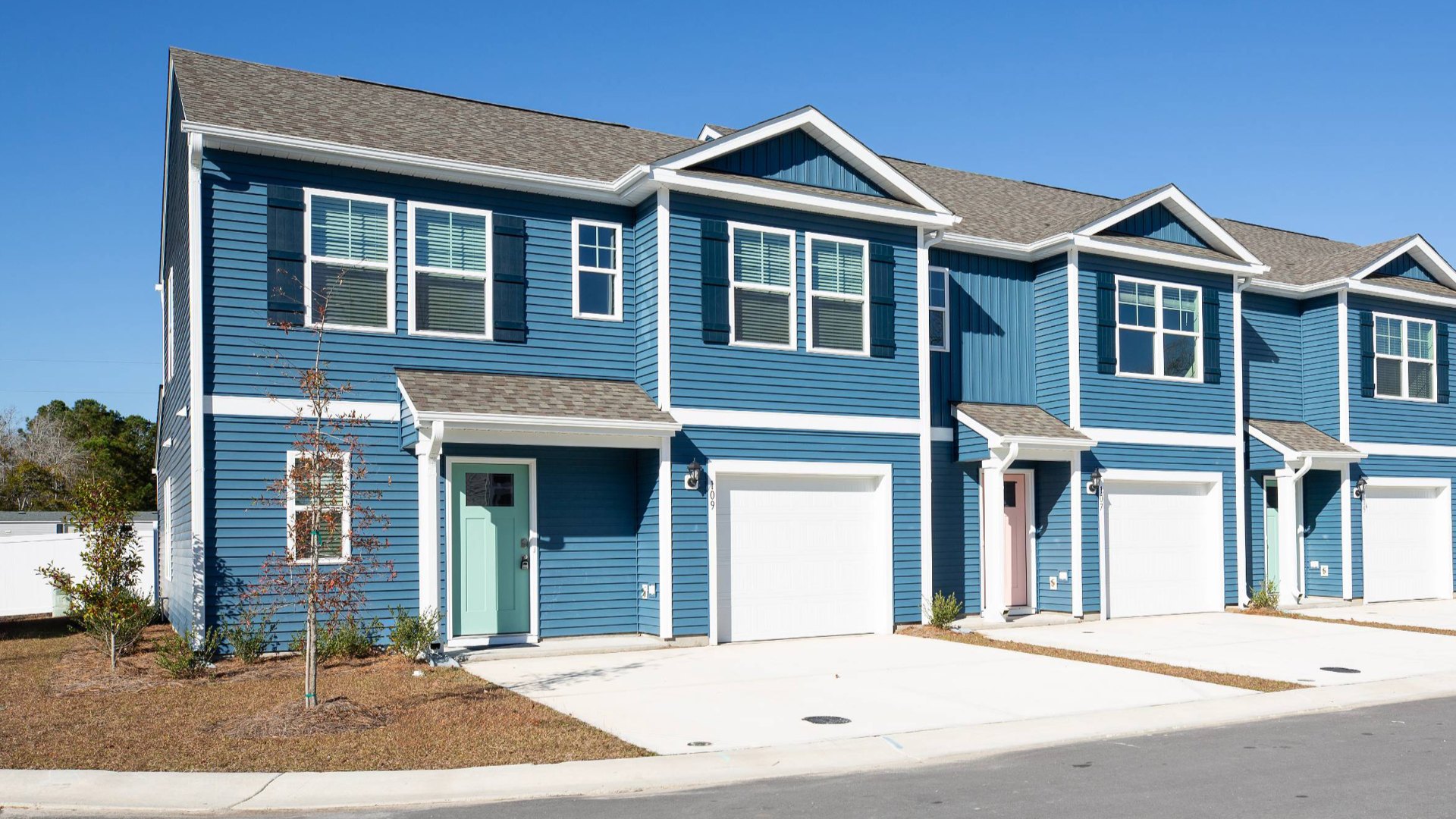 Welcome to the Norman a 4-bedroom, 2.5-bathroom, 1,763 square foot end unit townhome that's not just a house, but your future happy place! Located in our Townes at SeaBrooke community in Leland, North Carolina.