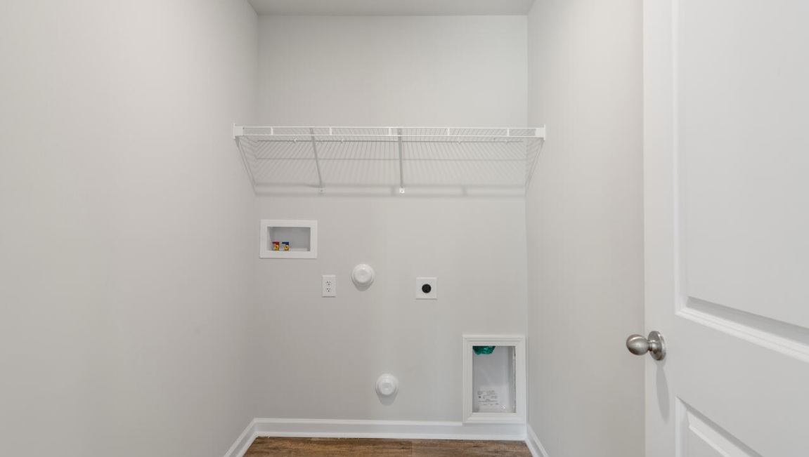 The primary suite is conveniently located just off the living room. Upstairs, there are 3 more bedrooms, a shared bathroom and a loft area, adding to the flexibility of the layout. For those in search of a contemporary townhome with a functional layout, the Norman is an excellent choice.