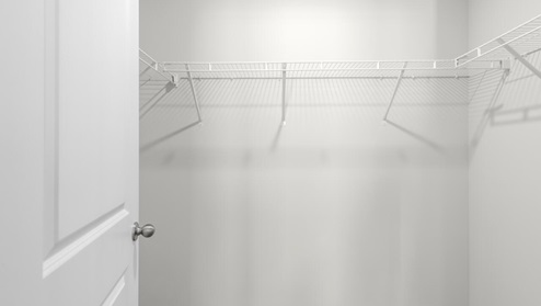 The second floor features the primary bedroom with a walk-in closet and double vanities.