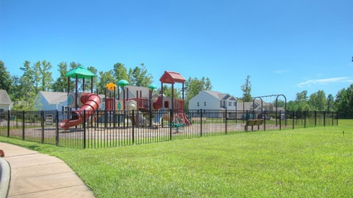 Residents enjoy community amenities that include a pool, pavilion, fire pit, playground, grill stations and sand volleyball.