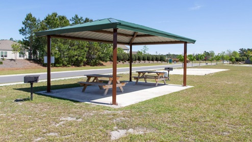 Residents enjoy community amenities that include a pool, pavilion, fire pit, playground, grill stations and sand volleyball.