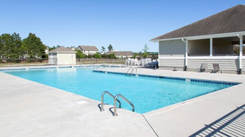 Residents enjoy community amenities that include a pool, pavilion, fire pit, playground, grill stations and sand volleyball.