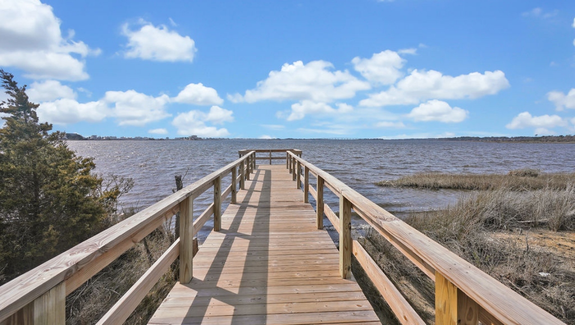 Homeowners will feel like they're on vacation when they splash in the elegant neighborhood swimming pool, lounge on the spacious sundeck and prepare a delicious meal in the outdoor grilling kitchen.