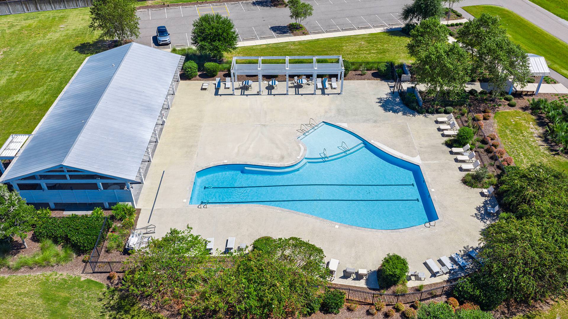 Homeowners will feel like they're on vacation when they splash in the elegant neighborhood swimming pool, lounge on the spacious sundeck and prepare a delicious meal in the outdoor grilling kitchen.