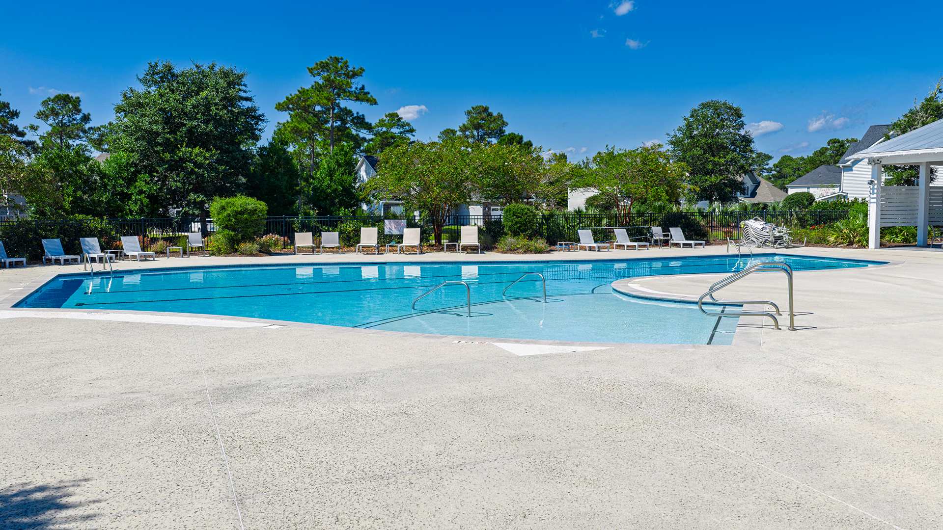 Homeowners will feel like they're on vacation when they splash in the elegant neighborhood swimming pool, lounge on the spacious sundeck and prepare a delicious meal in the outdoor grilling kitchen.