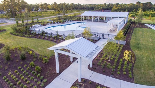 Residents will feel like they're on vacation when they splash in the elegant neighborhood swimming pool, lounge on the spacious sundeck and prepare a delicious meal in the outdoor grilling kitchen.