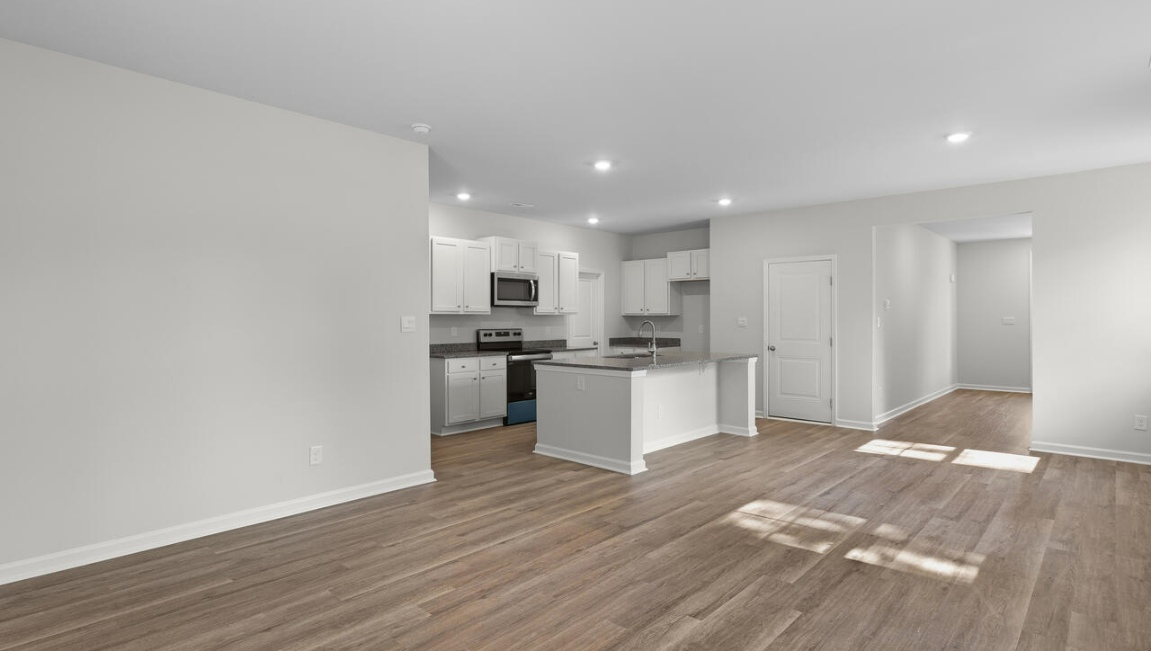 The flexible first floor includes a versatile guest room or office or playroom! Upstairs you'll find the large primary suite, two additional bedrooms and a generous loft area provide a perfect setting for entertainment, relaxation, or work.