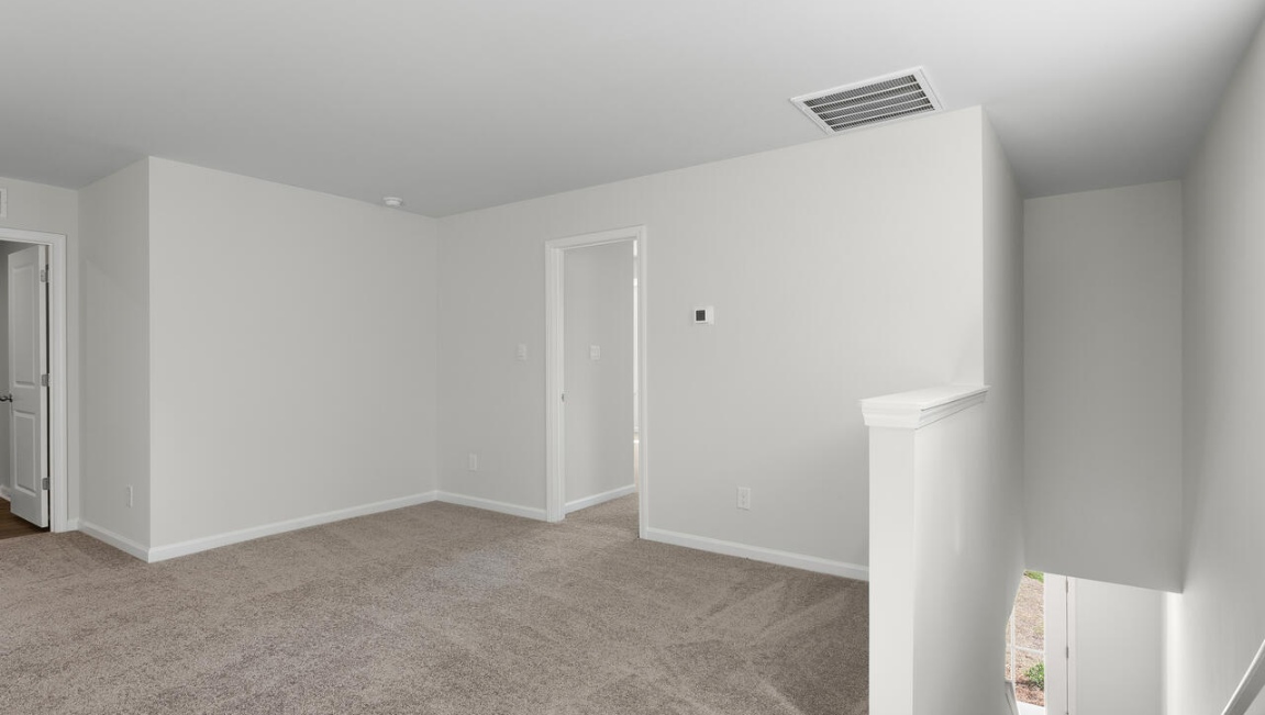 The flexible first floor includes a versatile guest room or office or playroom! Upstairs you'll find the large primary suite, two additional bedrooms and a generous loft area provide a perfect setting for entertainment, relaxation, or work.