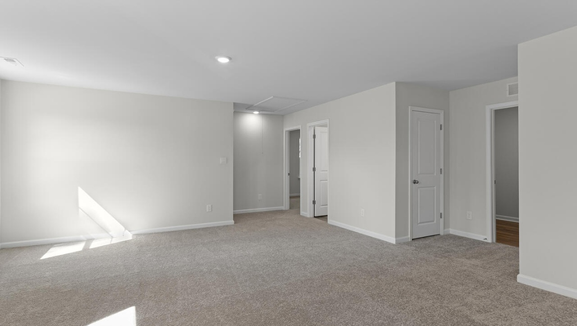 The flexible first floor includes a versatile guest room or office or playroom! Upstairs you'll find the large primary suite, two additional bedrooms and a generous loft area provide a perfect setting for entertainment, relaxation, or work.