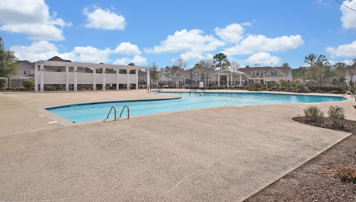 Homeowners will feel like they're on vacation when they splash in the elegant neighborhood swimming pool, lounge on the spacious sundeck and prepare a delicious meal in the outdoor grilling kitchen.