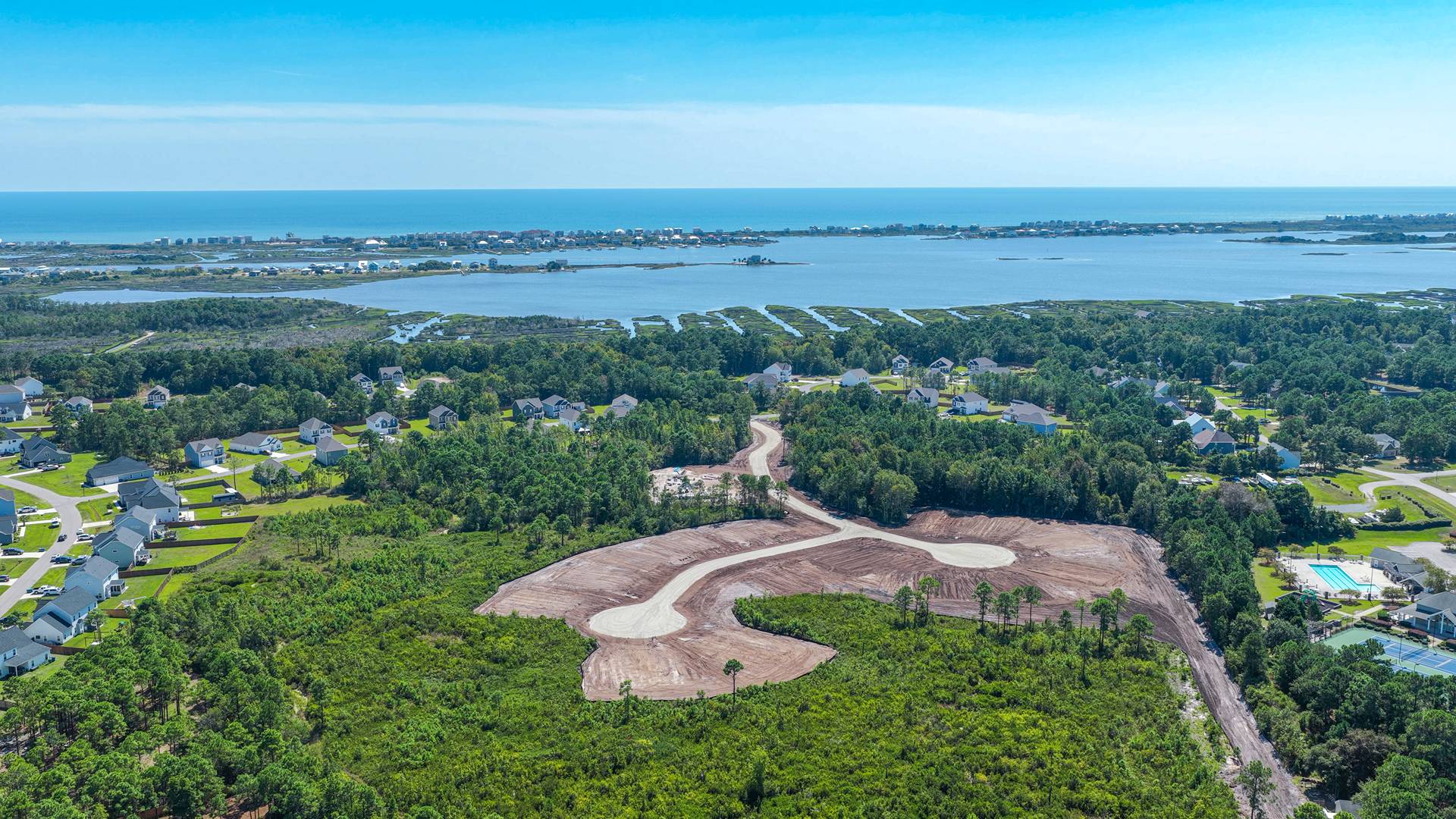 Homeowners will feel like they're on vacation when they splash in the elegant neighborhood swimming pool, lounge on the spacious sundeck and prepare a delicious meal in the outdoor grilling kitchen.