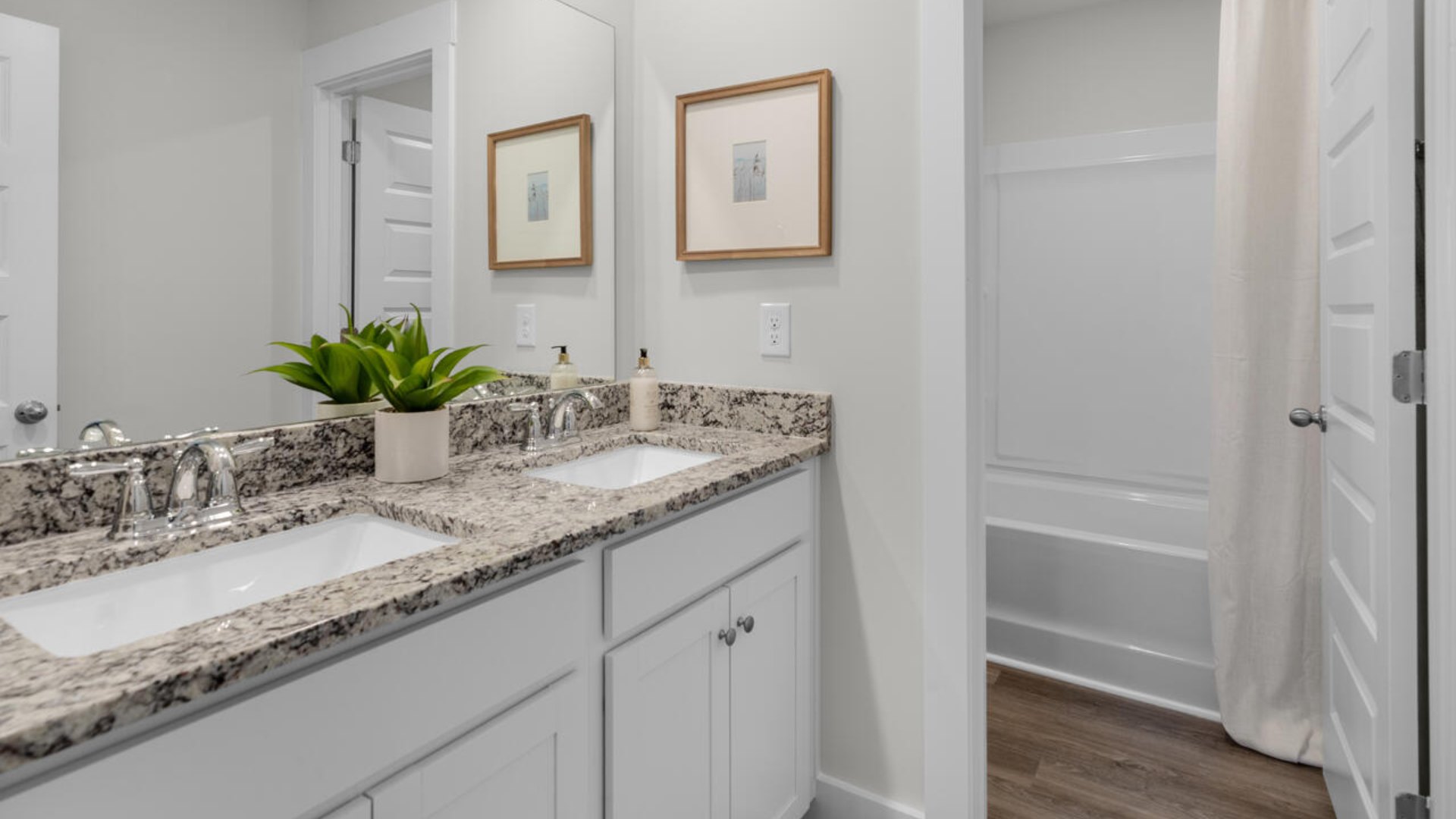 The flexible first floor includes a versatile guest room or office or playroom! Upstairs you'll find the large primary suite, two additional bedrooms and a generous loft area provide a perfect setting for entertainment, relaxation, or work.