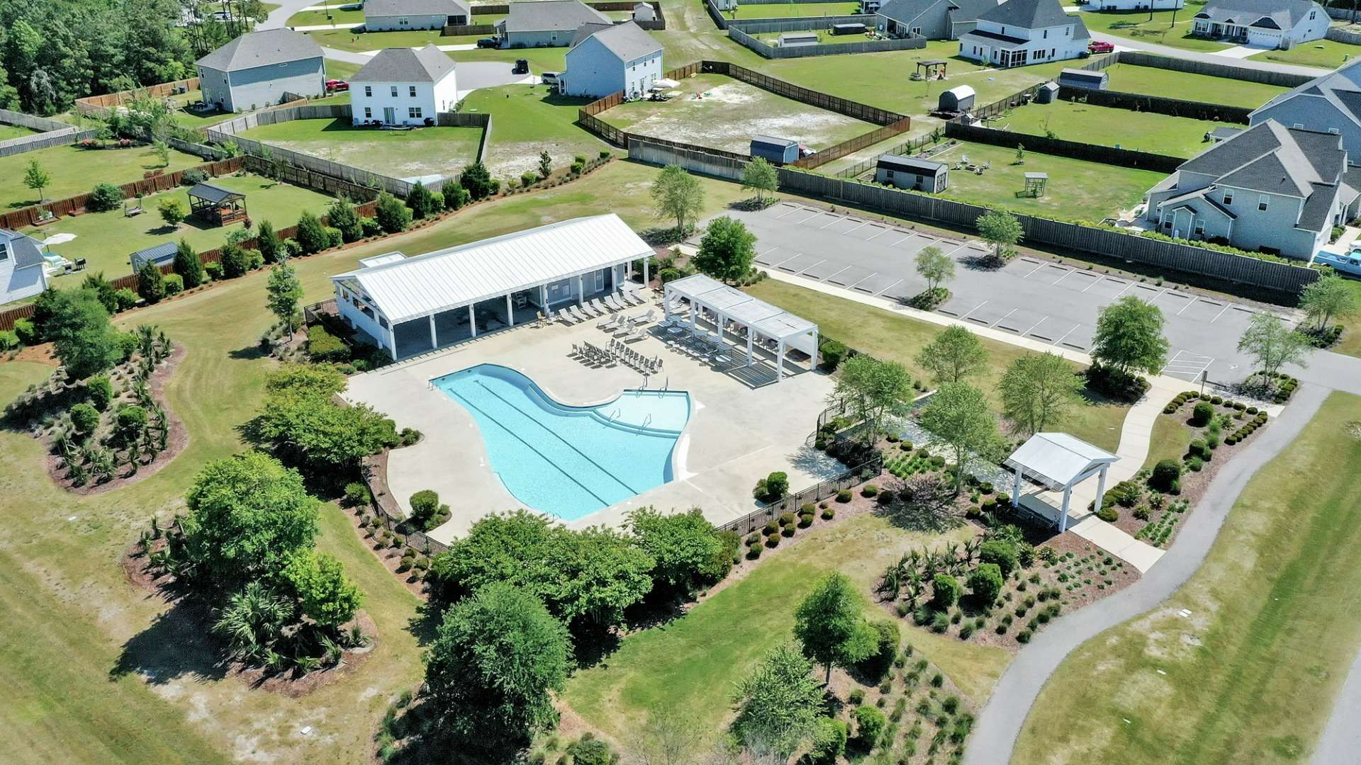 Homeowners will feel like they're on vacation when they splash in the elegant neighborhood swimming pool, lounge on the spacious sundeck and prepare a delicious meal in the outdoor grilling kitchen.