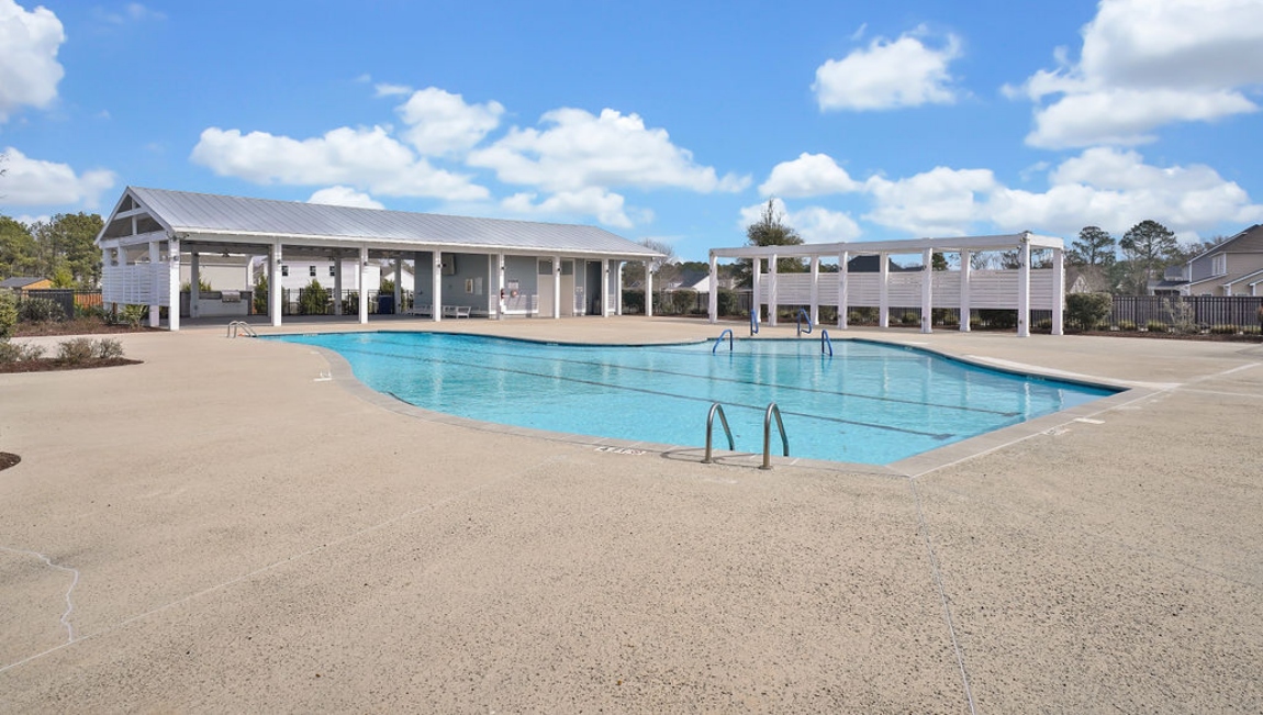 Homeowners will feel like they're on vacation when they splash in the elegant neighborhood swimming pool, lounge on the spacious sundeck and prepare a delicious meal in the outdoor grilling kitchen.