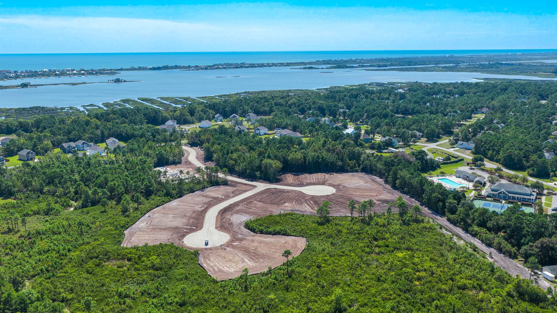 Homeowners will feel like they're on vacation when they splash in the elegant neighborhood swimming pool, lounge on the spacious sundeck and prepare a delicious meal in the outdoor grilling kitchen.