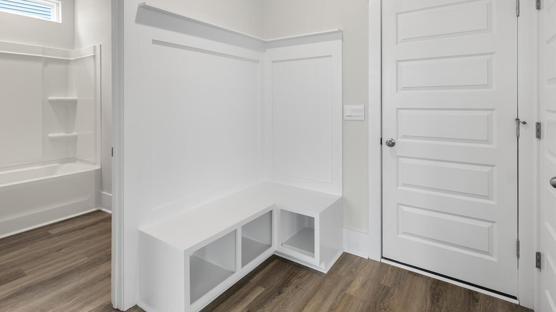 On the first floor, the formal dining room is ideally located next to a spacious open-concept living area and kitchen, allowing for effortless interaction with guests while preparing meals.