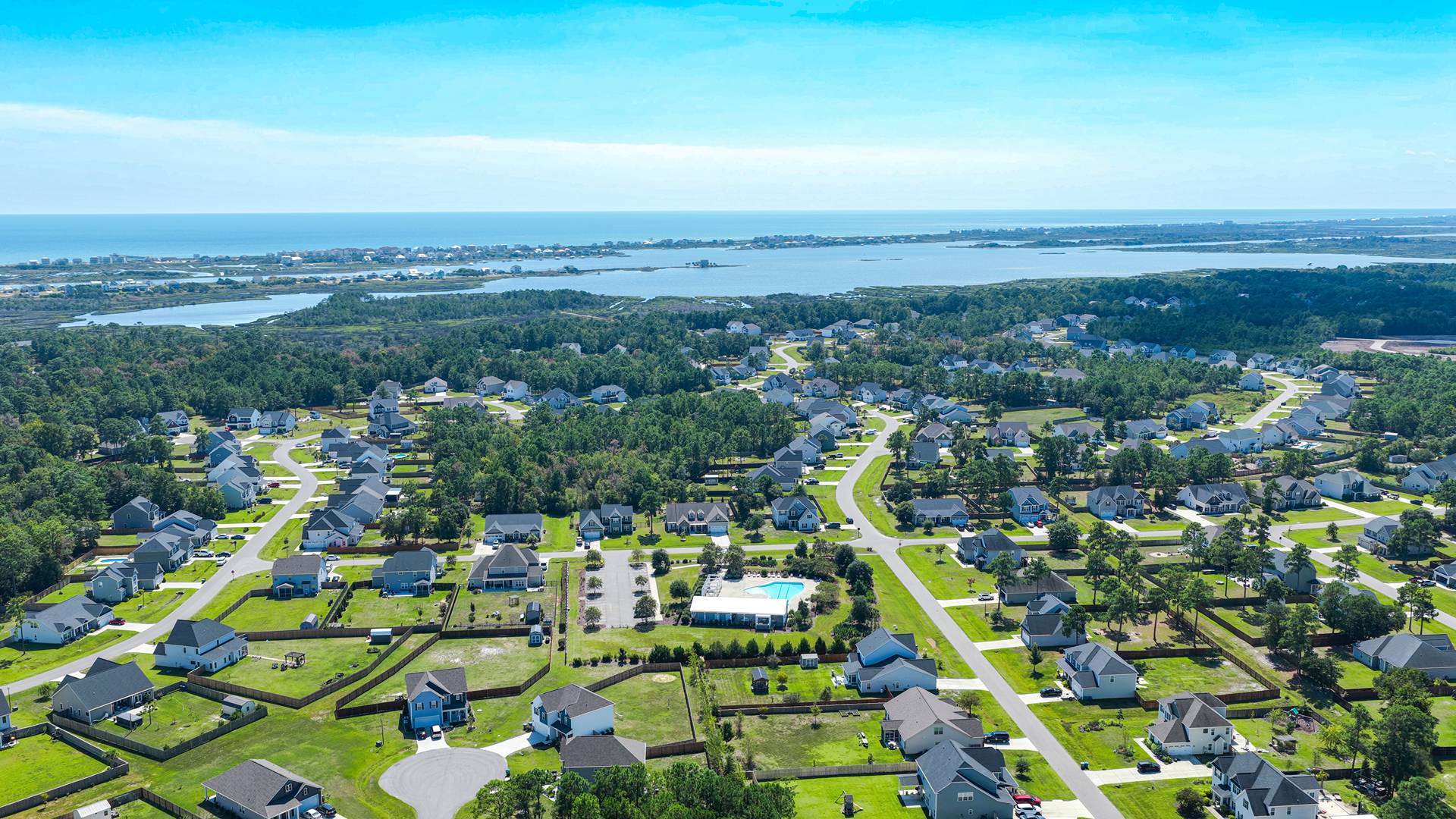 Homeowners will feel like they're on vacation when they splash in the elegant neighborhood swimming pool, lounge on the spacious sundeck and prepare a delicious meal in the outdoor grilling kitchen.