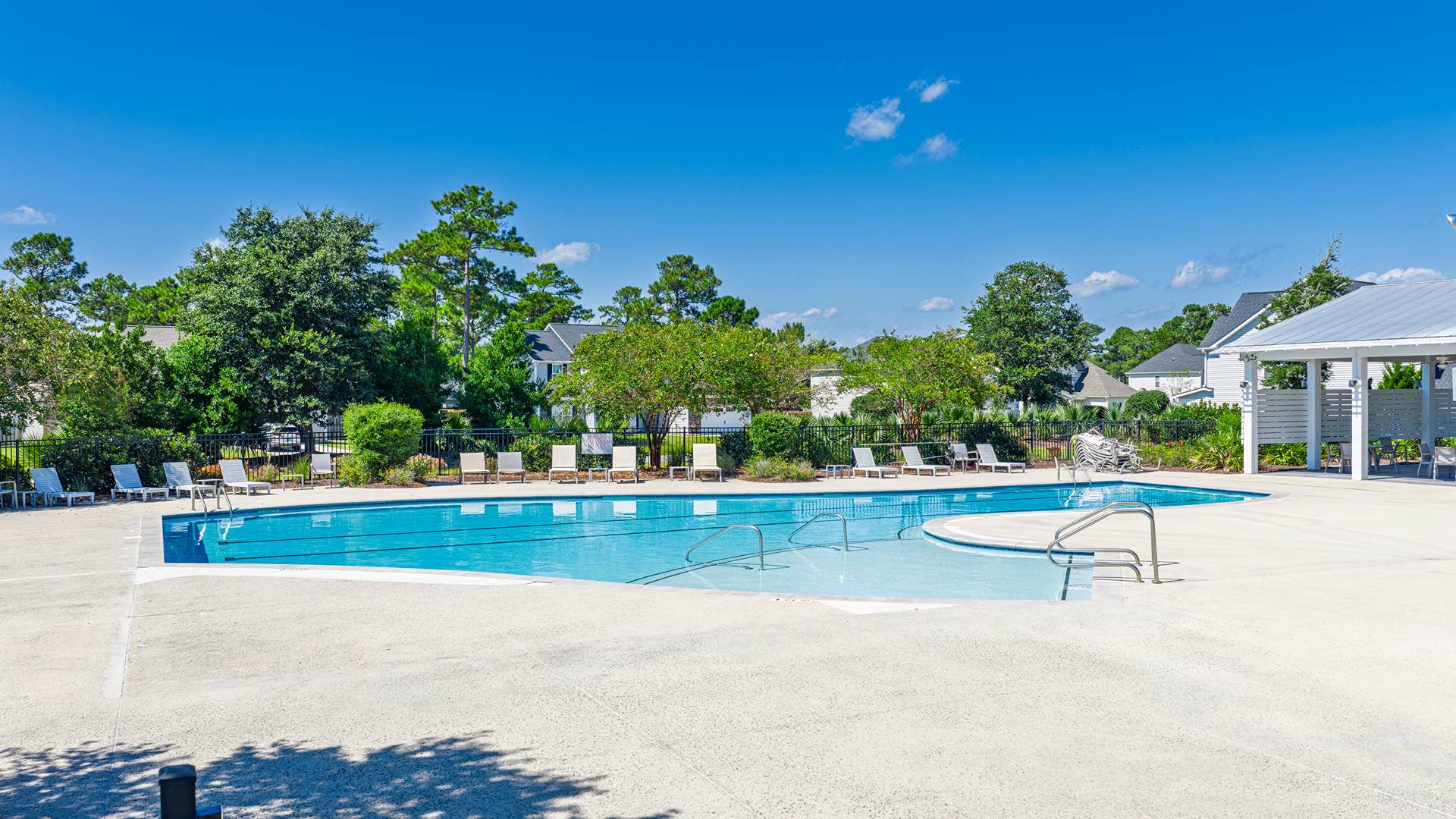 Homeowners will feel like they're on vacation when they splash in the elegant neighborhood swimming pool, lounge on the spacious sundeck and prepare a delicious meal in the outdoor grilling kitchen.