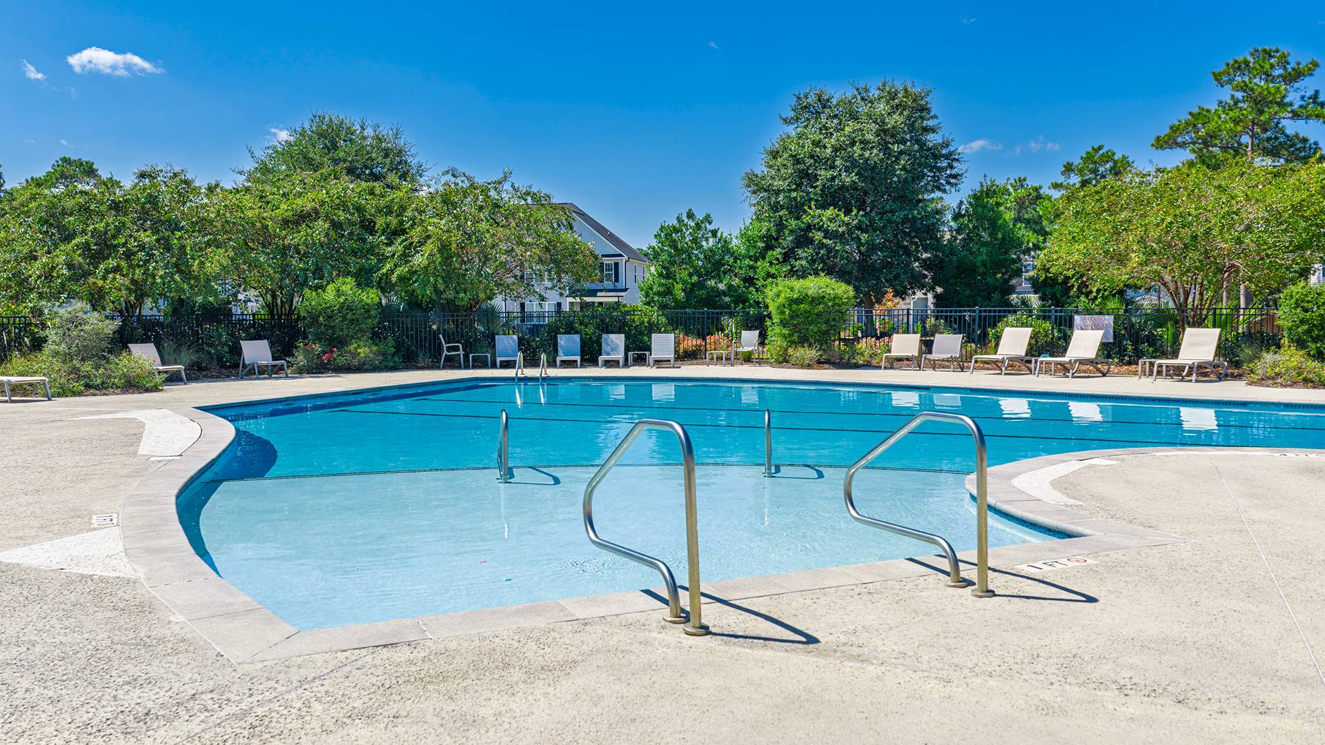 Homeowners will feel like they're on vacation when they splash in the elegant neighborhood swimming pool, lounge on the spacious sundeck and prepare a delicious meal in the outdoor grilling kitchen.