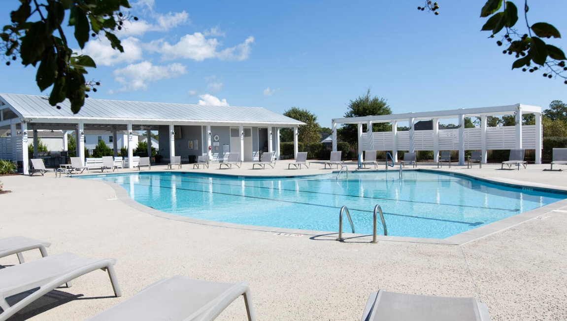 Homeowners will feel like they're on vacation when they splash in the elegant neighborhood swimming pool, lounge on the spacious sundeck and prepare a delicious meal in the outdoor grilling kitchen.