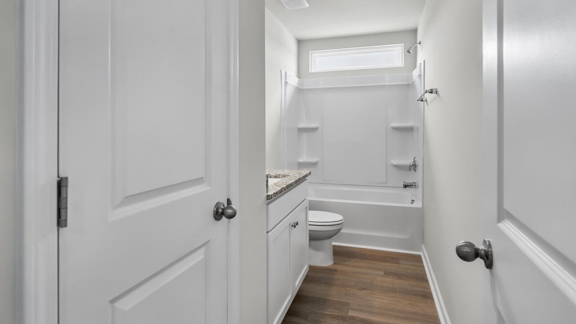 Upstairs you will find four more spacious bedrooms, two full bathrooms, and a great loft space. There are so many ways to customize this home to fit your needs!