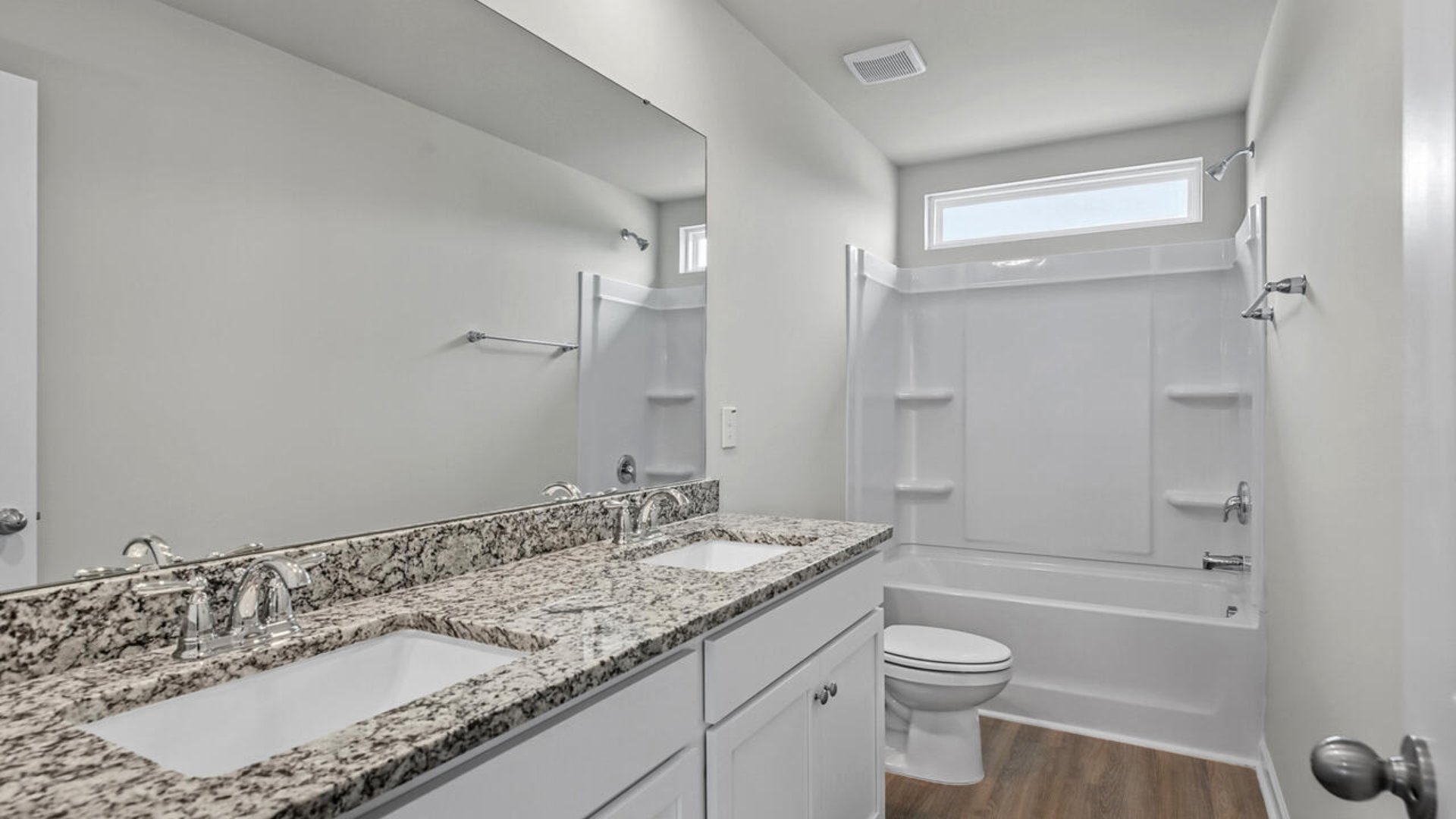 Upstairs you will find four more spacious bedrooms, two full bathrooms, and a great loft space. There are so many ways to customize this home to fit your needs!