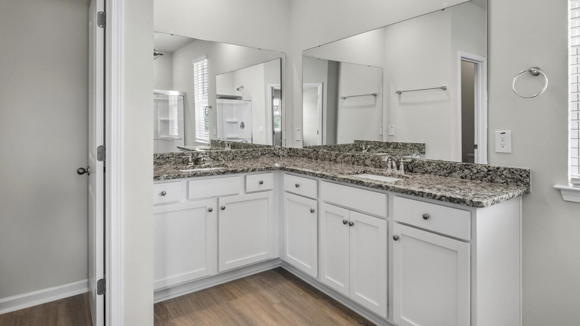 The primary bedroom has its own attached bathroom that features a walk-in closet and all the space you need to get ready in the morning.