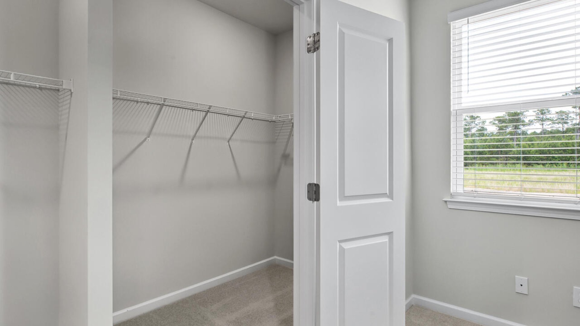 The primary bedroom has its own attached bathroom that features a walk-in closet and all the space you need to get ready in the morning.