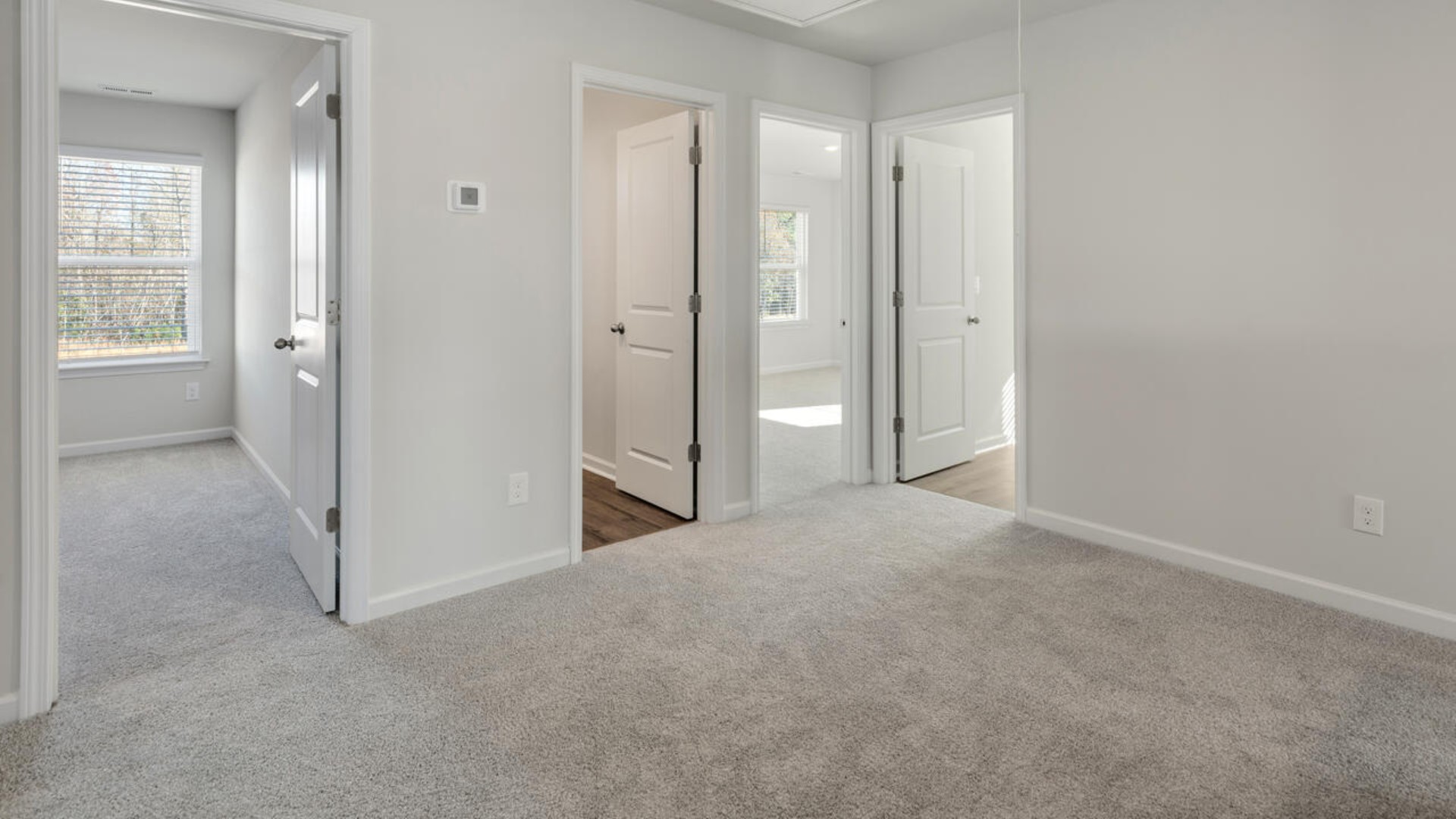 Upstairs you will find four more spacious bedrooms, two full bathrooms, and a great loft space. There are so many ways to customize this home to fit your needs!