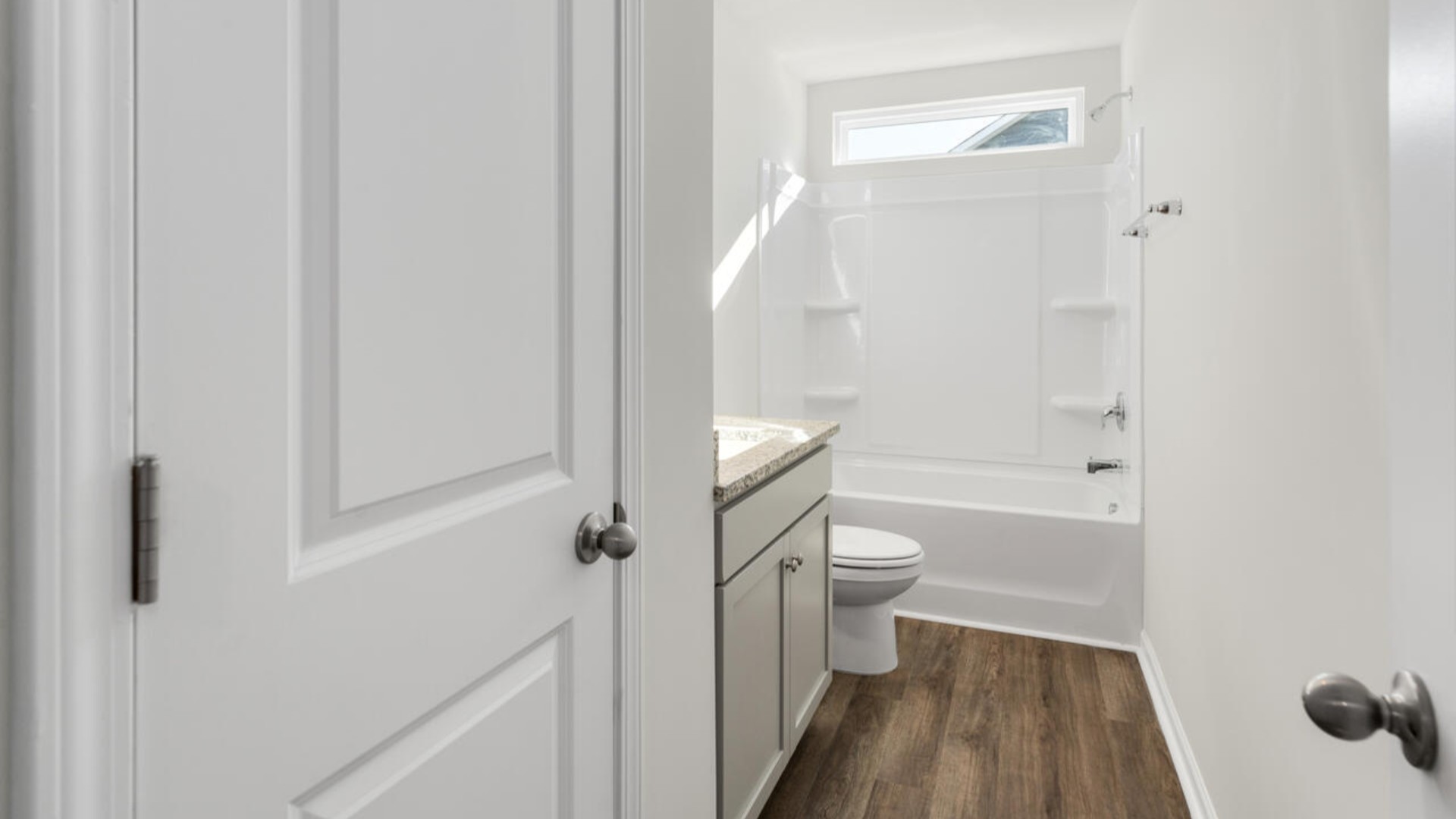 The primary bedroom has its own attached bathroom that features a walk-in closet and all the space you need to get ready in the morning. Sharing a sink isn’t a worry with the double vanity, and you also get additional privacy with a separate door for the toilet and shower.