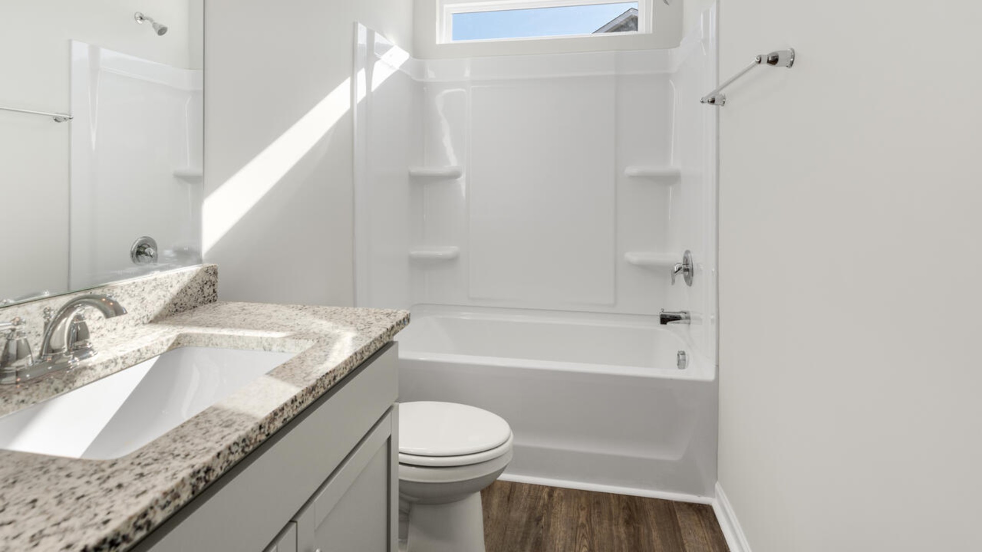The primary bedroom has its own attached bathroom that features a walk-in closet and all the space you need to get ready in the morning. Sharing a sink isn’t a worry with the double vanity, and you also get additional privacy with a separate door for the toilet and shower.