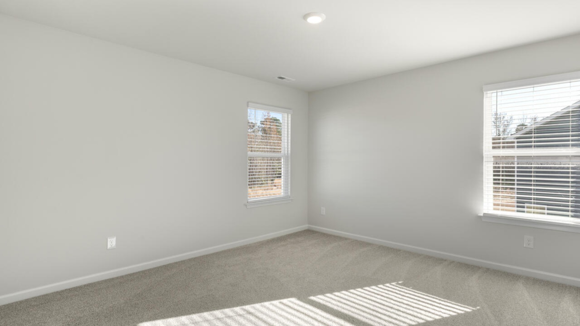 The primary bedroom has its own attached bathroom that features a walk-in closet and all the space you need to get ready in the morning. Sharing a sink isn’t a worry with the double vanity, and you also get additional privacy with a separate door for the toilet and shower.