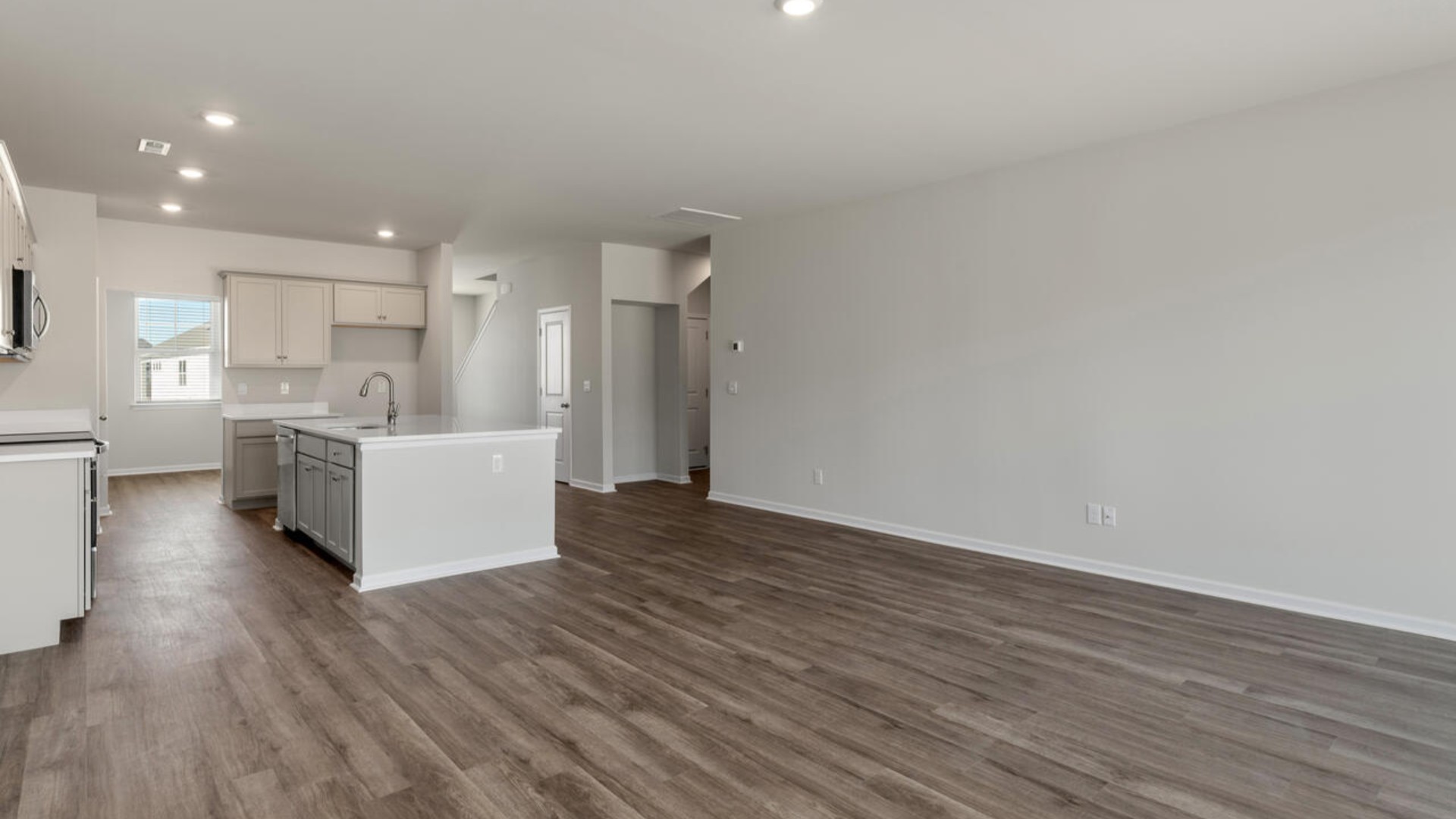 The home features a spacious design with modern touches. With its elegance, functionality, and prime location, the Tillman delivers an exceptional lifestyle in Sneads Ferry's most sought-after communities.