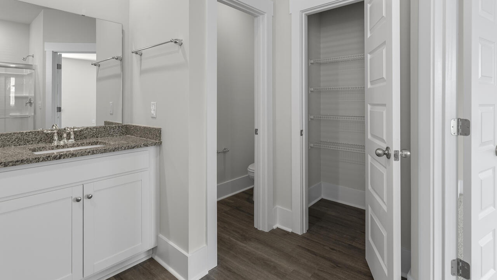 As you enter the home you will find a formal dining room, open concept kitchen and family room with additional seating at the large kitchen island, and a first floor primary bedroom retreat.