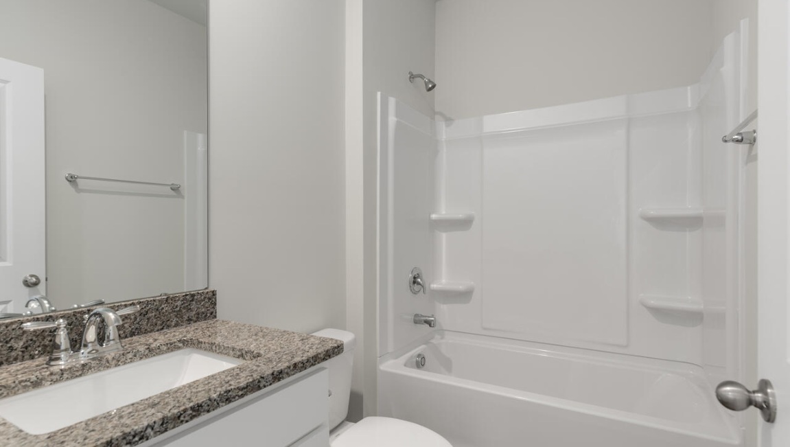 In addition, there are another 2 bedrooms and full bath. In every bedroom you’ll have carpeted floors and a closet in each room. Whether these rooms become bedrooms, office spaces, or other bonus rooms, there is sure to be comfort.