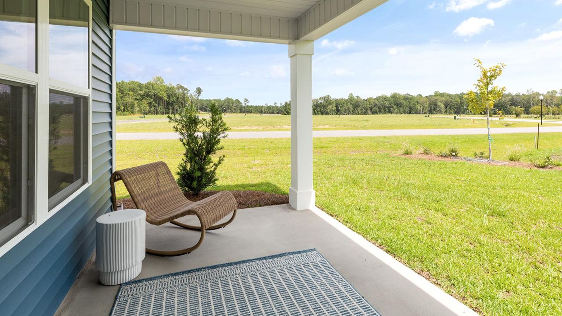 Enjoy the covered porch perfect for entertaining and enjoying the Carolina evenings