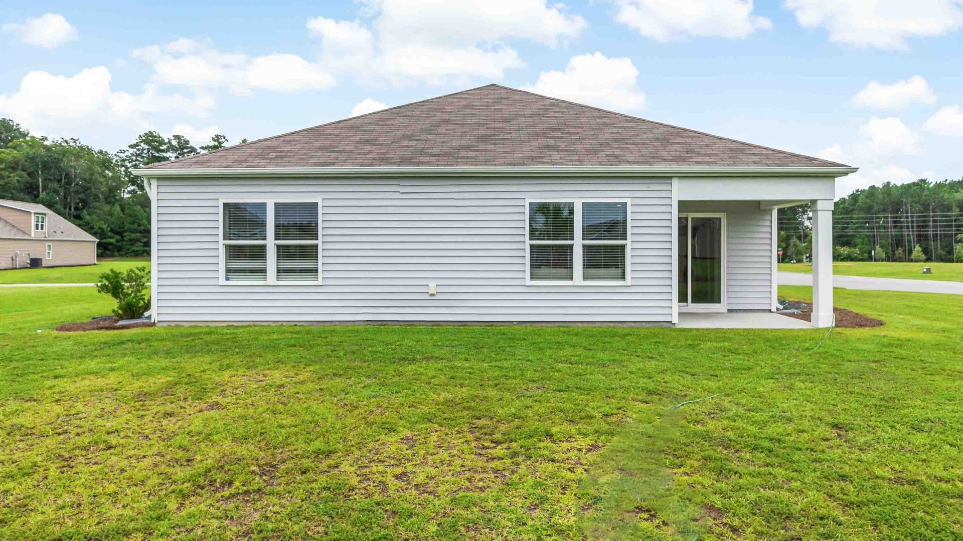 Enjoy the covered porch perfect for entertaining and enjoying the Carolina evenings.