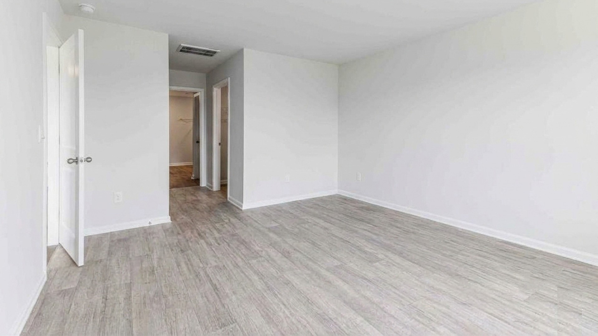 The Primary Suite offers a massive closet and a luxurious bathroom with a walk-in shower, linen closet, and dual vanity.