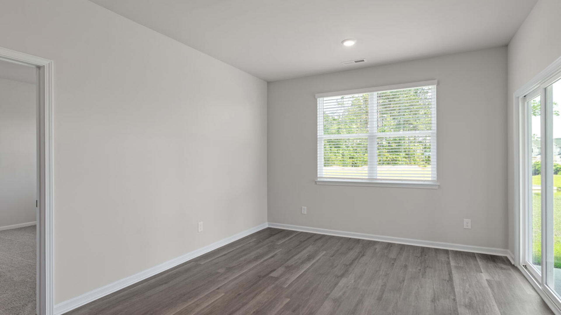 The Primary Suite offers a massive closet and a luxurious bathroom with a walk-in shower, linen closet, and dual vanity.